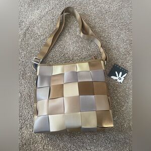 Comely Seatbelt Shoulder Bag.